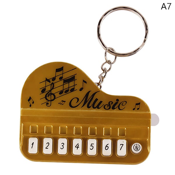 Kannettava soitinlelu Piano-avaimenperä Mini Electronic A7