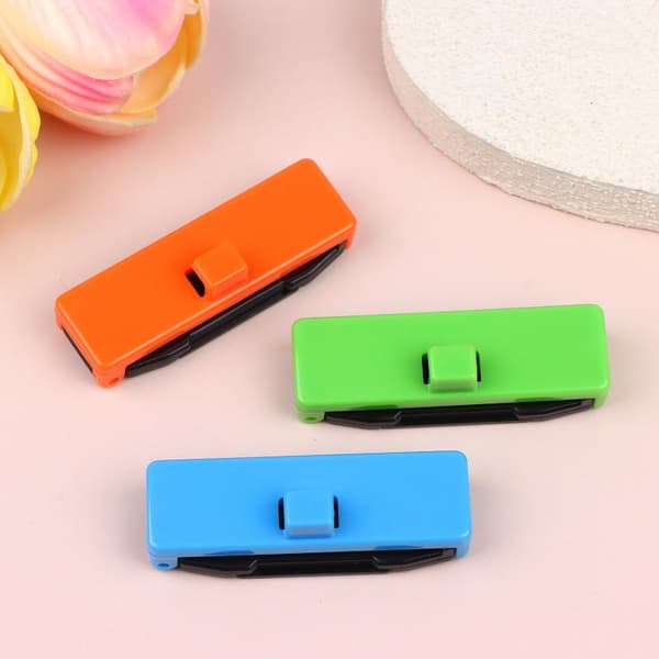 2 stk. bilbelteholder, stopper, spenneklemme for bilsete Green