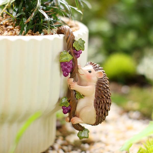Klättrande igelkottfigur Blomkrukekramare