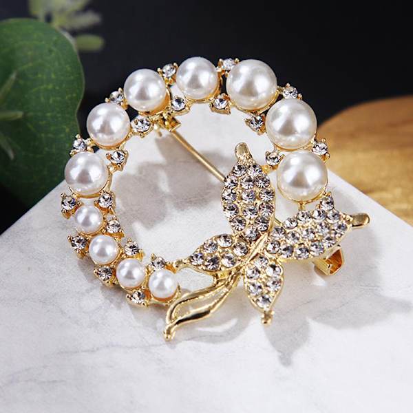 Uusi Pearl Rhinestone Circle Butterfly rintaneula naisille Tren 1PC