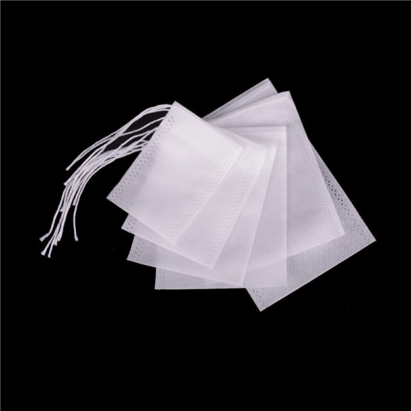 100 stk Non-woven tomme teposer String Heat Seal Filter Paper He 9*10cm