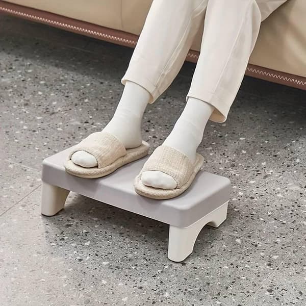 Ergonominen jalkatuki gray