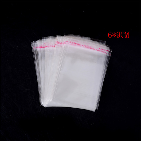 100 stk/pose OPP Clear Seal Selvklebende plastsmykker Hjem Pa 6*9CM