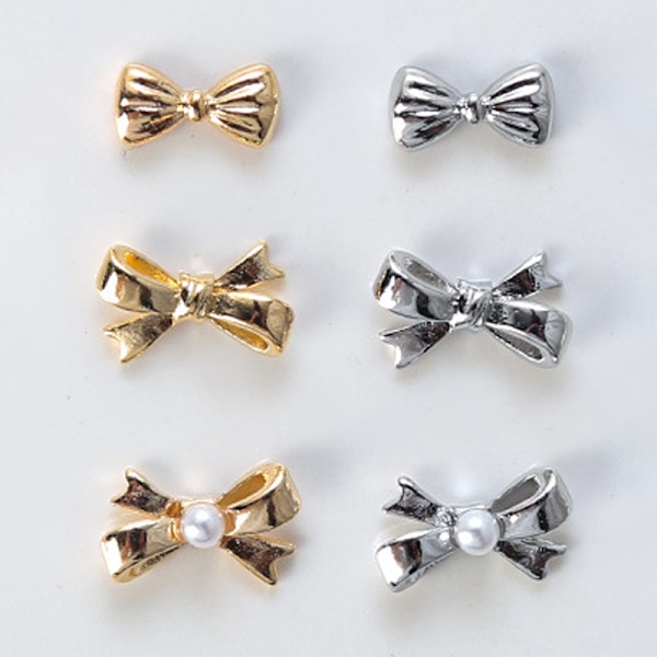 10 stk 3D mini metalbånd bowknot Nail Art Pearl Rhinestones D HJ1377