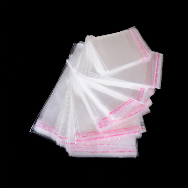 100 stk/pose OPP Clear Seal Selvklebende plastsmykker Hjem Pa 10*15CM