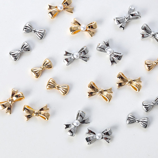 10 stk 3D mini metalbånd bowknot Nail Art Pearl Rhinestones D HJ1377