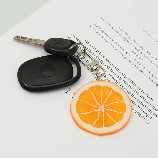 PVC-simulaatio hedelmä-avaimenperä Sitruunaviipaleet Mallit Laukku riippu Orange