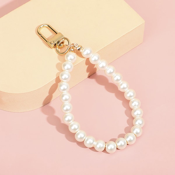 Pearls helmillä koristellut avaimenperät naisille autolaukku Bluetooth kuulokeavain Gold