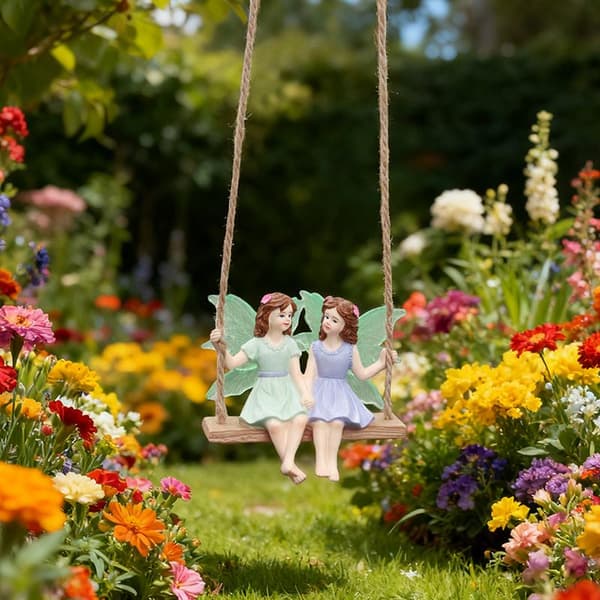 Fairy På En Gunga Hängande Staty