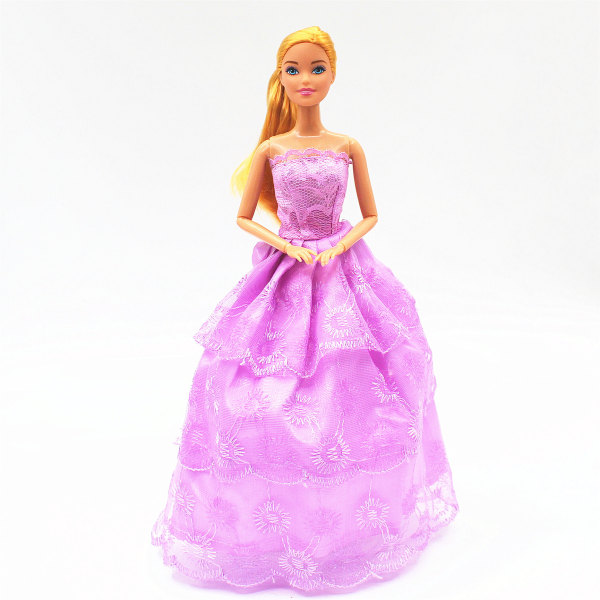 Barbie Be a Fashion Designer -nukkepuvun pukukoristelusetti, 10 asua - satunnainen tyyli