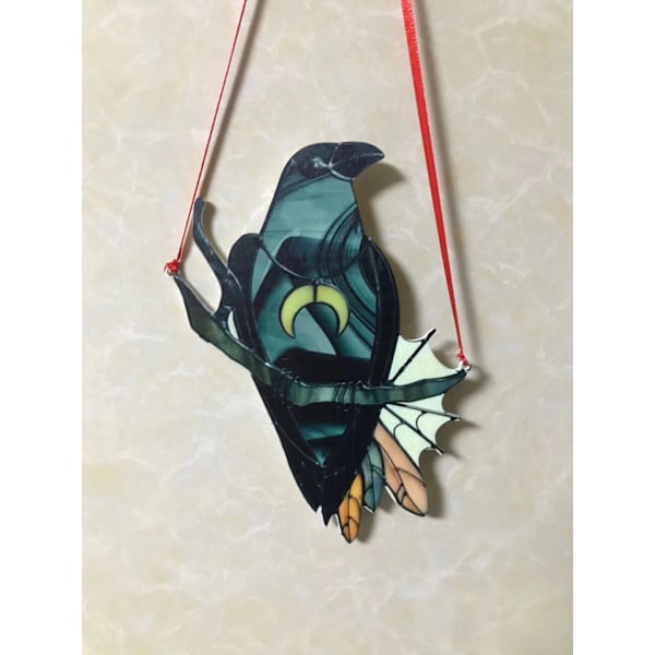 Mystisk kråkeheks-ornament, farget solfanger, svart fugl med måne
