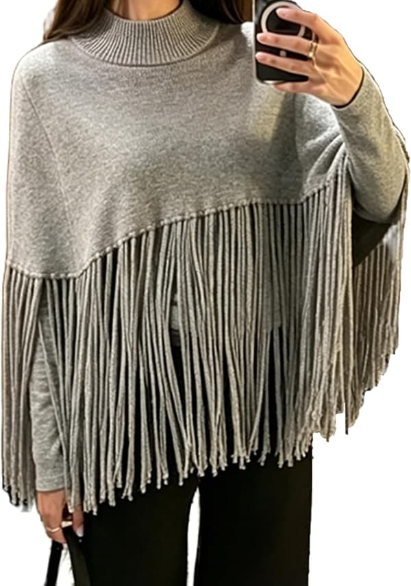 Stickad poncho-cape för dam med tofsar, polokrage och fransar, vintertröja