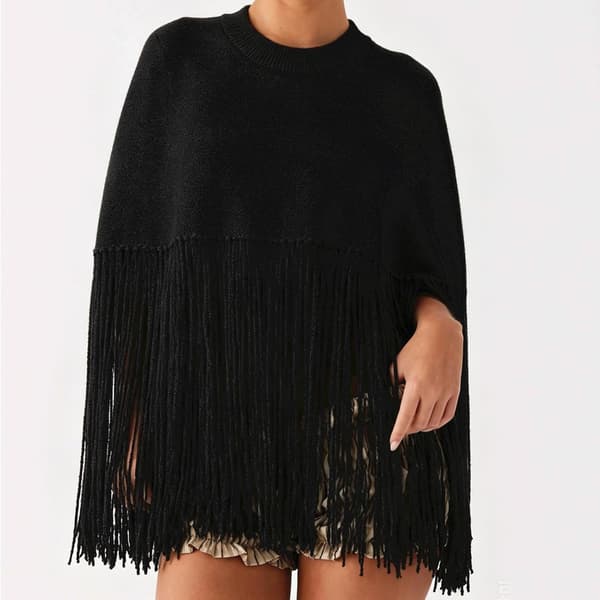 Stickad poncho-cape för dam med tofsar, polokrage och fransar, vintertröja