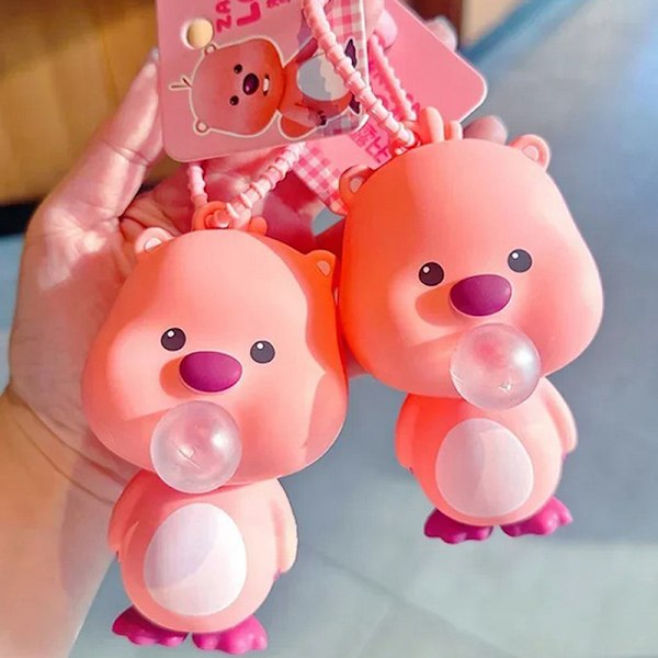 Loopy puhaltaa kuplia puristava ilo avaimenperä naisten rubiiniriipus onesize