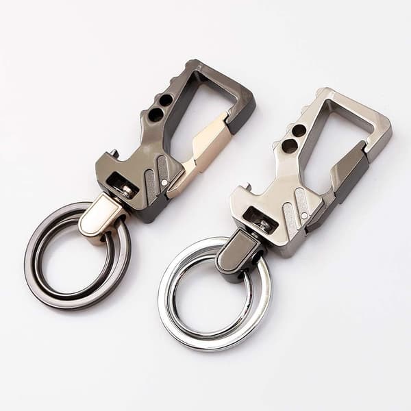 Guld + Silver 2-pack Bilnyckelring med Flasköppnare - 2 Metallringar - Pistolpipa