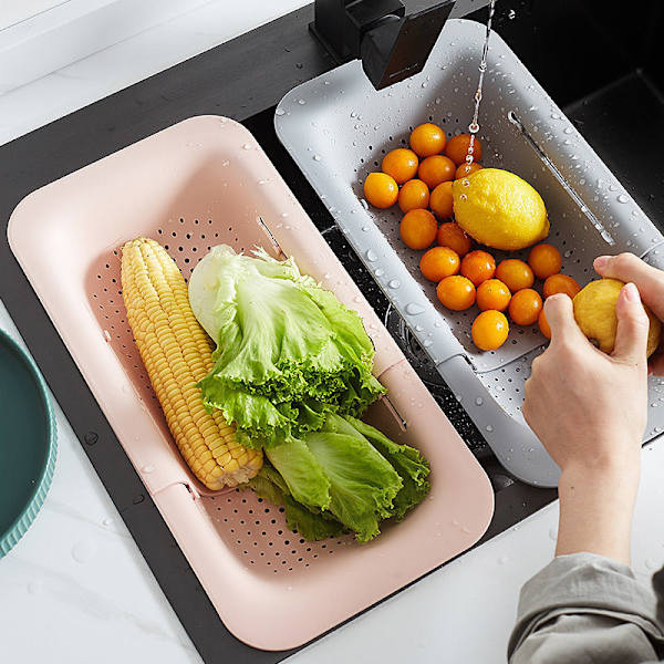 Sil over vasken silkurv for drenering av pasta, frukt og grønnsaker, rosa