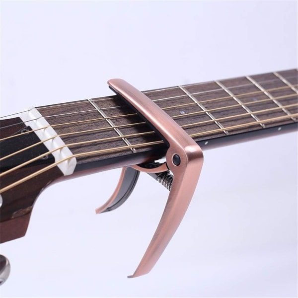 Soittimet Akustinen kitara Sähkökitara Metallikitara Ukulele-klipsit Yleistarvikkeet Ruusukultaiset viritysklipsit