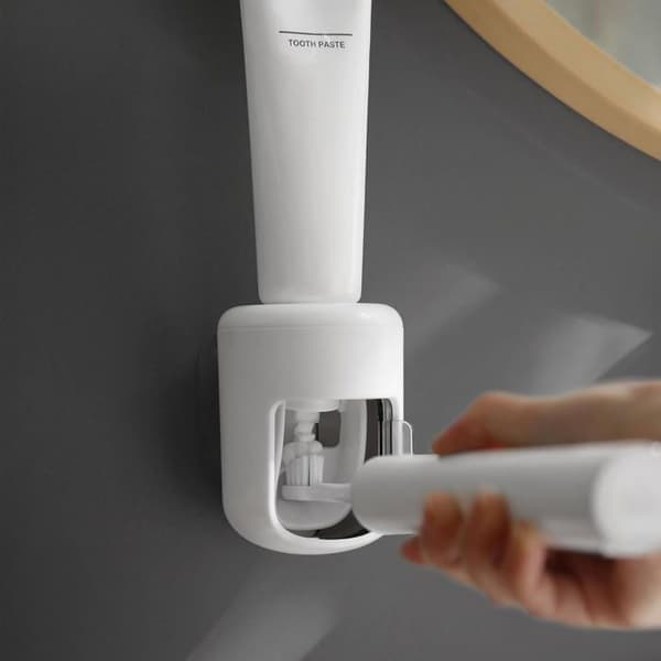 Nästa generations väggmonterade tandkrämsdispenser. Skyddande lock, universell design för barn/vuxna.