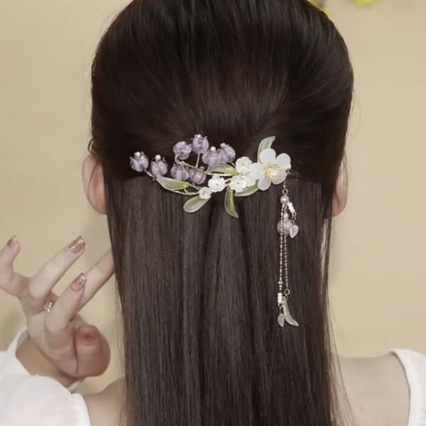Elegant lilla blomsterhårklemme med dusk til kvinner