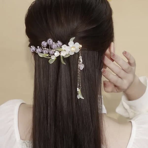 Elegant lilla blomsterhårklemme med dusk til kvinner