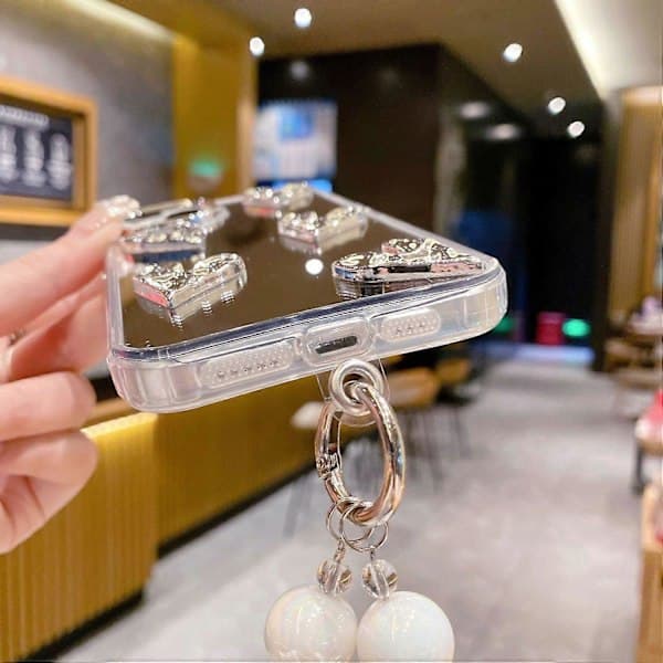 Stilig speiloverflate TPU+PC telefondeksel med armbånd til iPhone 14