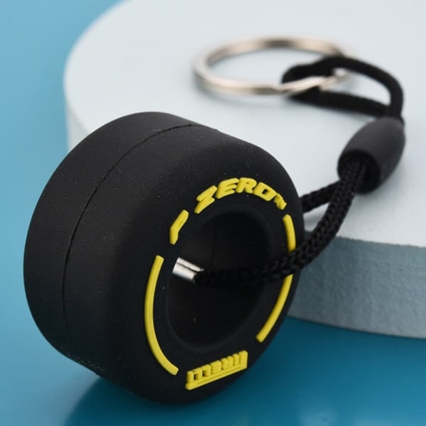 Auton renkaiden avaimenperä Autourheilun vanteiden avaimenperä Auton muotoilu Yellow