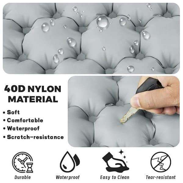 Rektangulær, lett å bære og komfortabel oppblåsbar setepute laget av grå nylon.