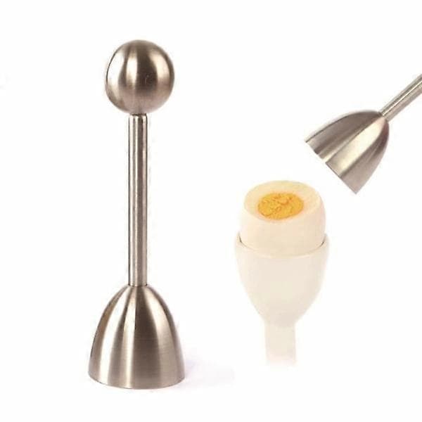 Eggknekker som kutter toppen av eggeskallet Sølv Sølv