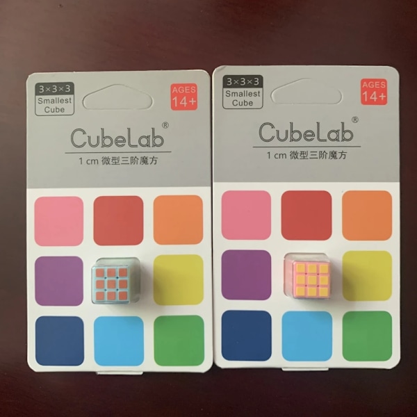 1 cm Mini Kub Minsta 3X3X3 Magiska Kuben 10 mm Pussel Fingertoppskub Speed 3X3 Micro Kub Vuxen DIY Samlarleksaker Barnpresent pink and blue 1cm