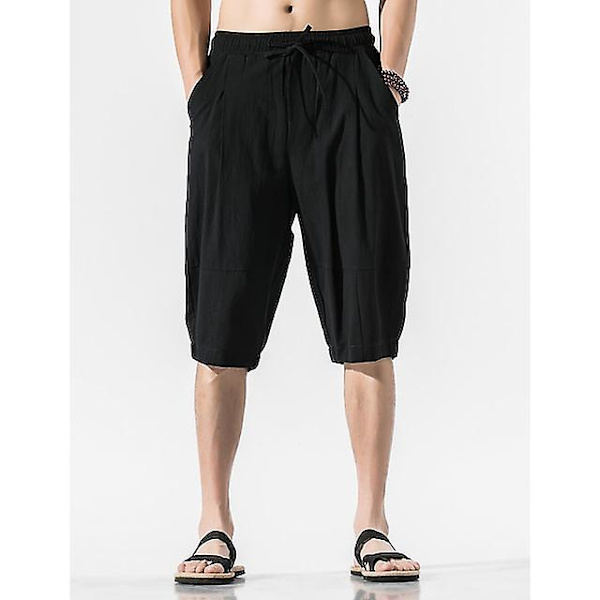 Miesten joogashortsit kiristysnyörillä tasku Capri-housut Alaosat Nopeasti kuivuvat kosteutta siirtävät kevyet yksiväriset muotishortsit Black 2XL