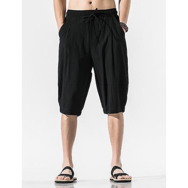 Miesten joogashortsit kiristysnyörillä tasku Capri-housut Alaosat Nopeasti kuivuvat kosteutta siirtävät kevyet yksiväriset muotishortsit Black 5XL