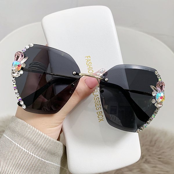 Rhinestone aurinkolasit