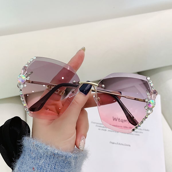Rhinestone aurinkolasit