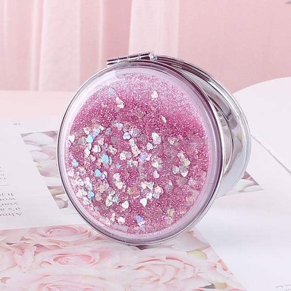 Kompakt och bärbar hopfällbar spegel - rosa, glittrande flytande sand