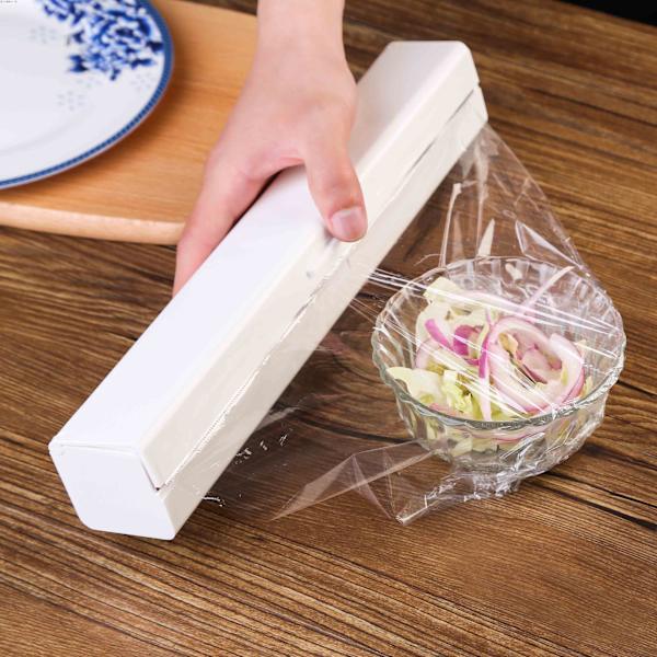 Køkkenredskaber - Pink Stretch film dispenser og skærer, plastfilm dispenser