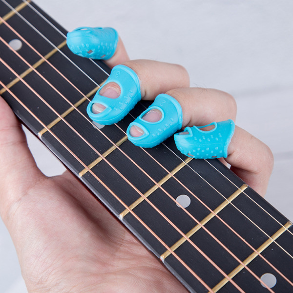 Silikongitarrfingerskydd Klar silikongitarrfingerskydd Set med 3 blå Lämplig för nybörjare ukulele eller gitarrspelare.