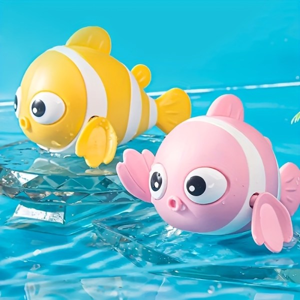 Lasten kylpy leluvauva leikkii vesipellekalaa Yellow