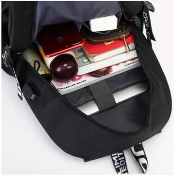 reppu Fortnite - vedenpitävä koululaukku USB- ja kuulokeliitännällä Black