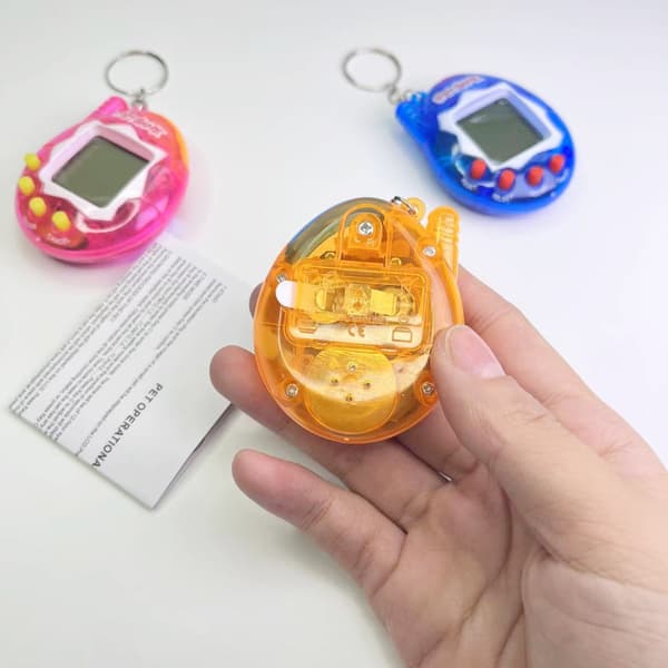 Mini Handheld Virtual Rabbit Pet Keychain Toy - Perfekt för Halloween-, jul- och påskpresenter Orange
