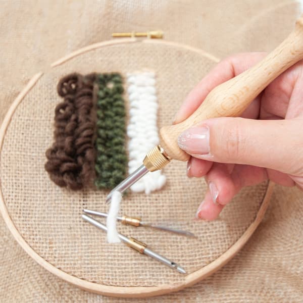 Broderinålssats för tråd och garn
