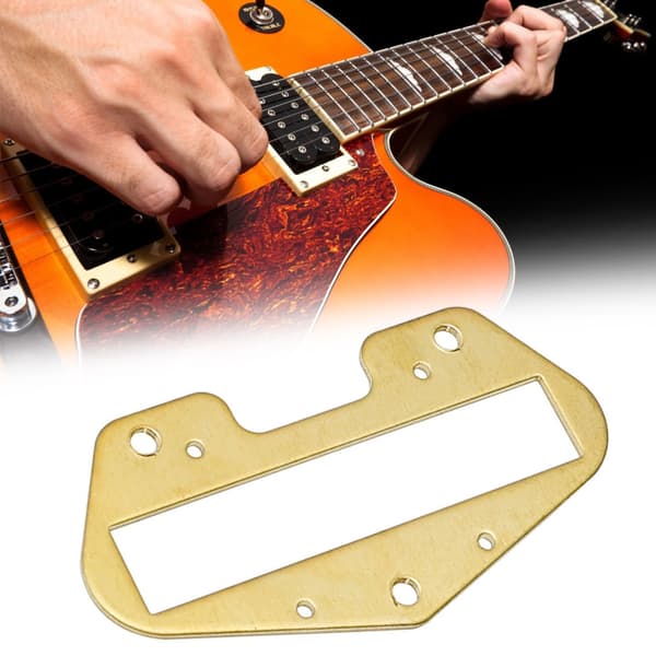 Kobberbunnplate for gitarbro-pickuper forbedrer gitarens lydkvalitet