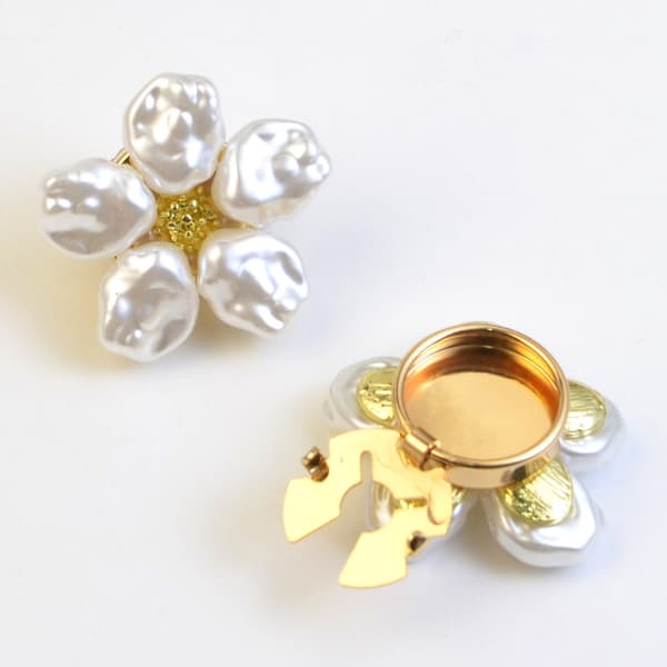 Elegante metalskjorteknapper blomsterform sofistikeret design legeringstekstur