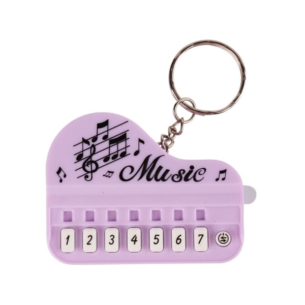 Elektroniskt tangentbord nyckelring i fickstorlek Minimusikleksak med flera ljudeffekter Perfekt för musikentusiaster Present