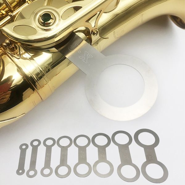 Saxofon kudde verktyg set används för att reparera flatheten av pad utsökt