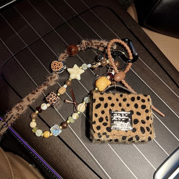 Trendig nyckelring med leopardtryck och pärlor, väskaccessoar för kvinnor och män