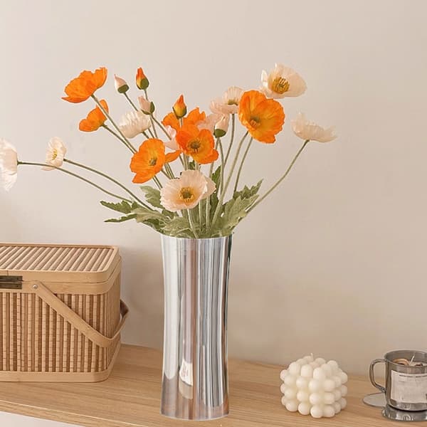 Blomvas i rostfritt stål för modern heminredning