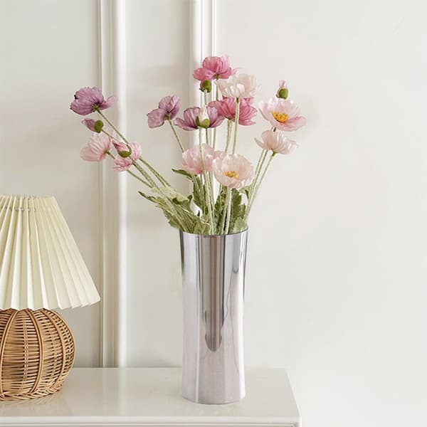 Blomvas i rostfritt stål för modern heminredning