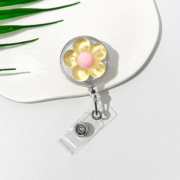 Utdragbar märkeshållare med blomdesign för tjocka kläder