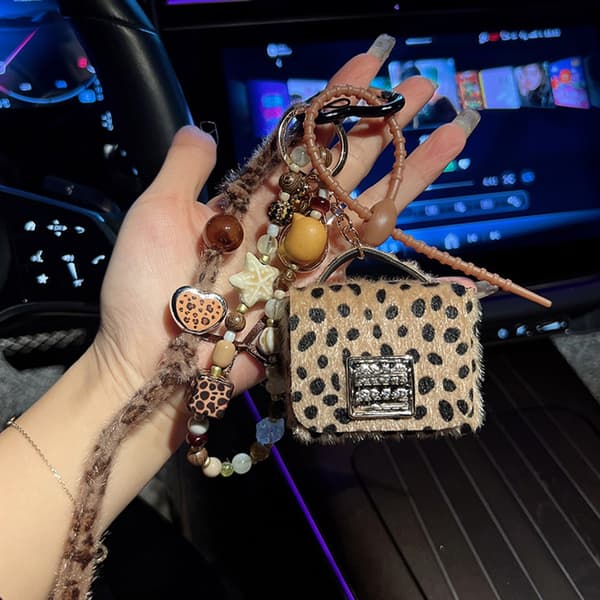 Trendig nyckelring med leopardtryck och pärlor, väskaccessoar för kvinnor och män