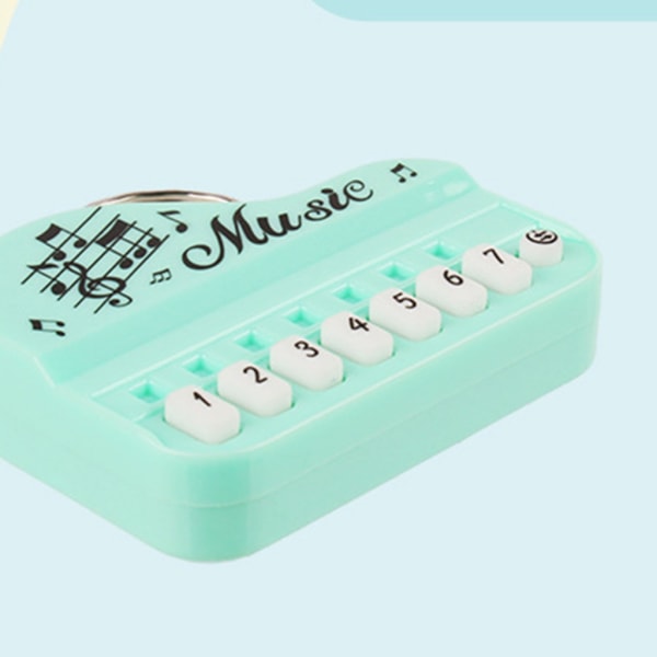Elektroniskt tangentbord nyckelring i fickstorlek Minimusikleksak med flera ljudeffekter Perfekt för musikentusiaster Present Yellow